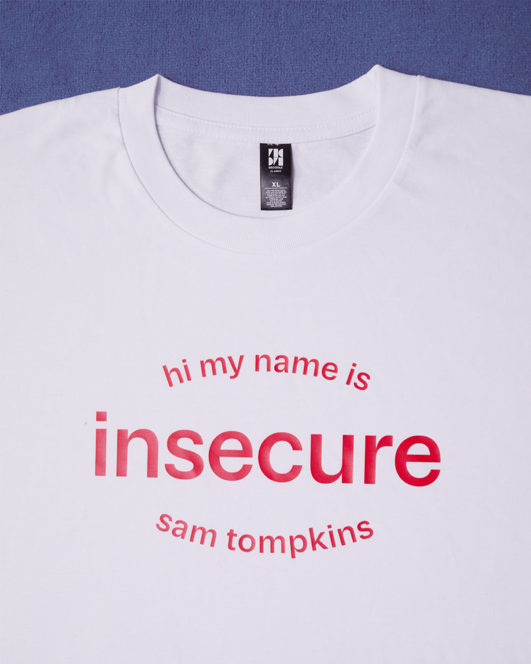 Sam Tompkins - insecure red/white t-shirt