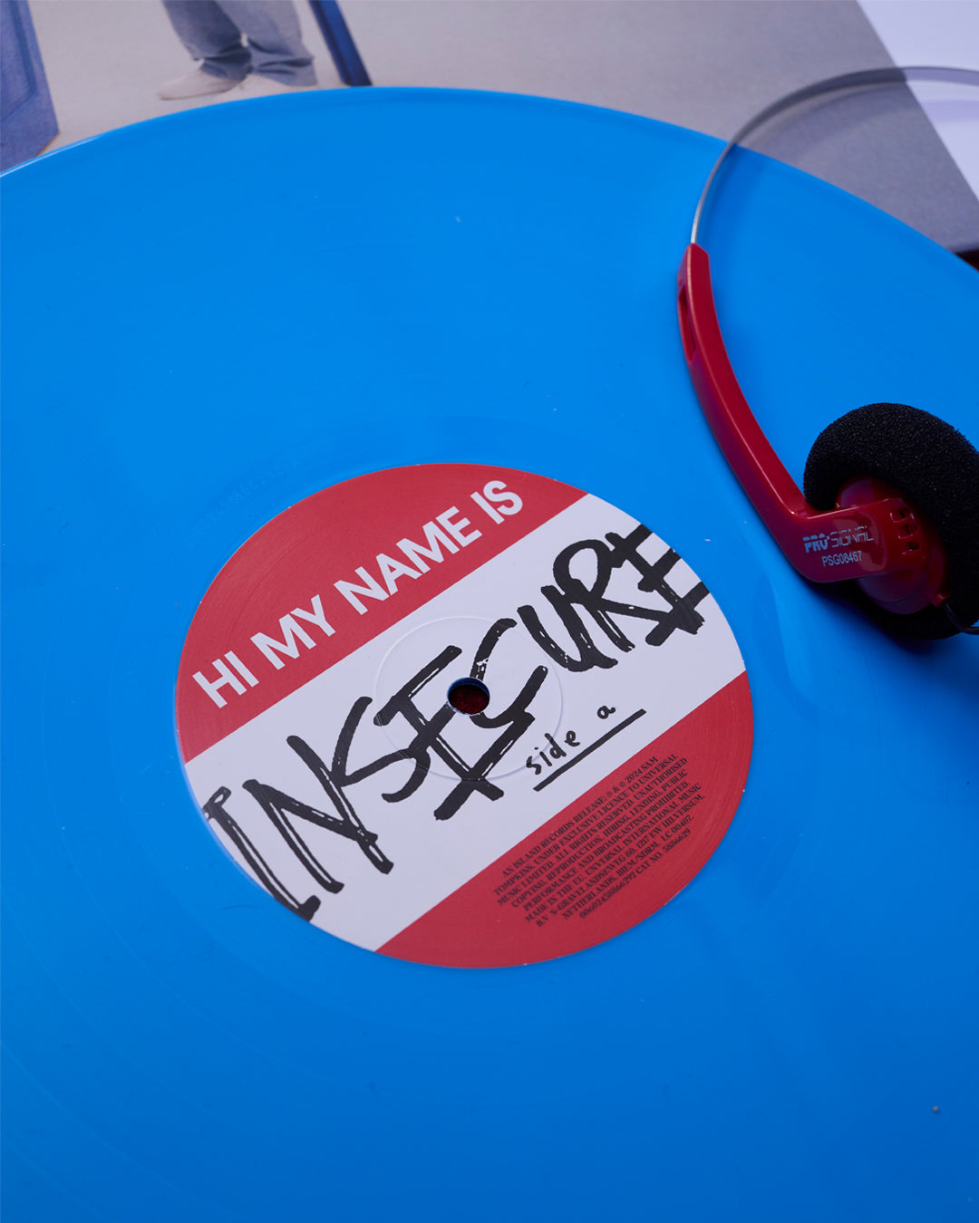 hi, my name is insecure - light blue vinyl + signed art card